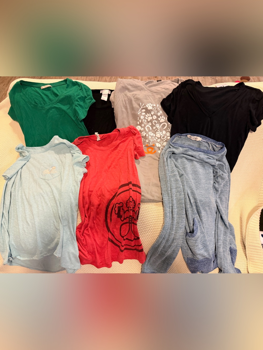 Bundle of 7 shirts in various colors and sizes